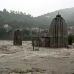 Devastating consequence of heavy rains: Mandi’s Panchvaktra Temple submerges in water and separated from mandi as bridge connecting it to city washed away